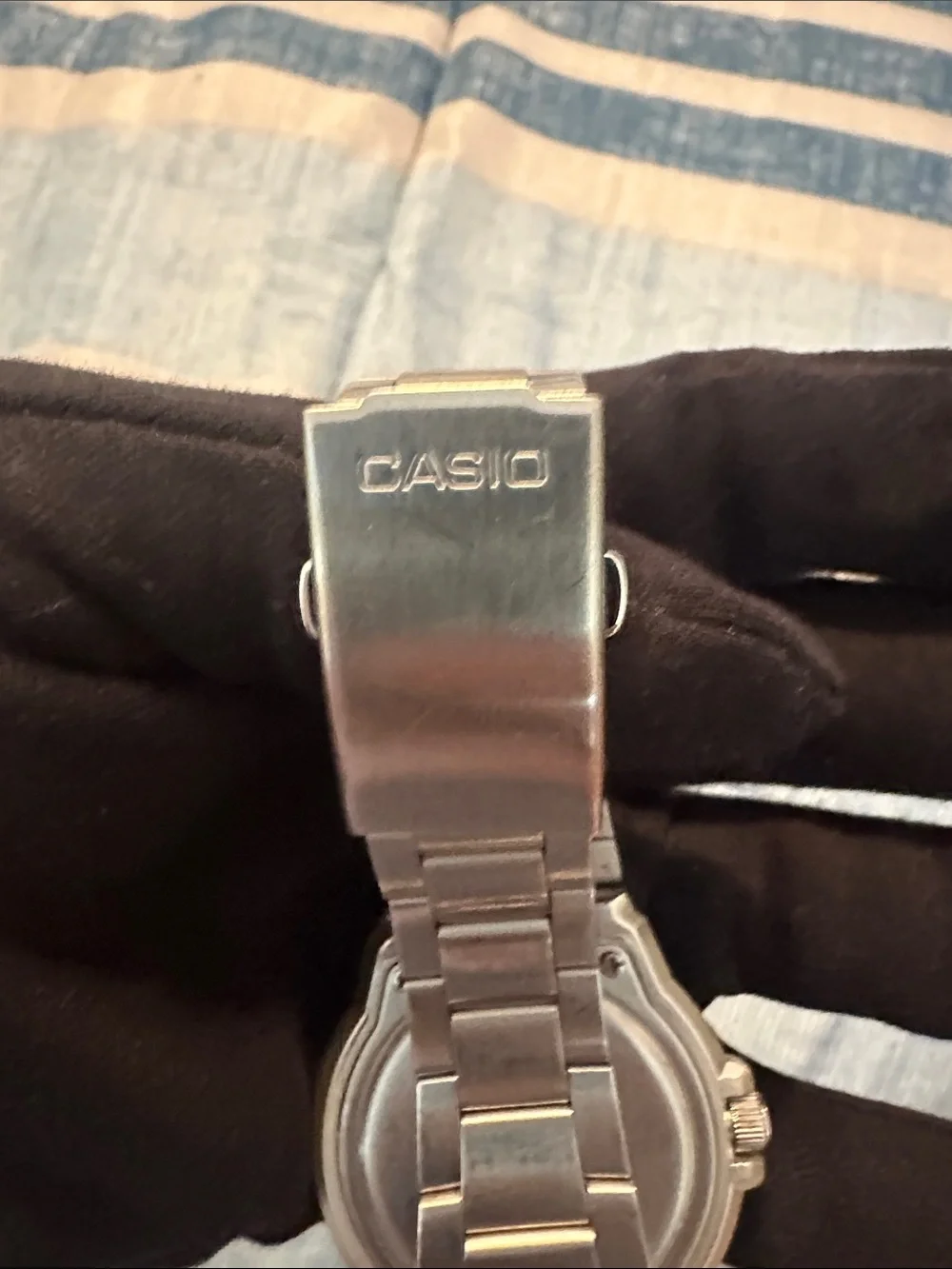 Casio Men's Silver Watch with White Dial and Black Bezel